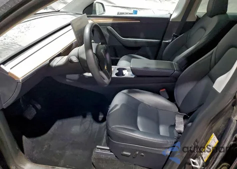 2024 Tesla Model Y from USA, damaged, VIN 7SAYGDEE1RF033715